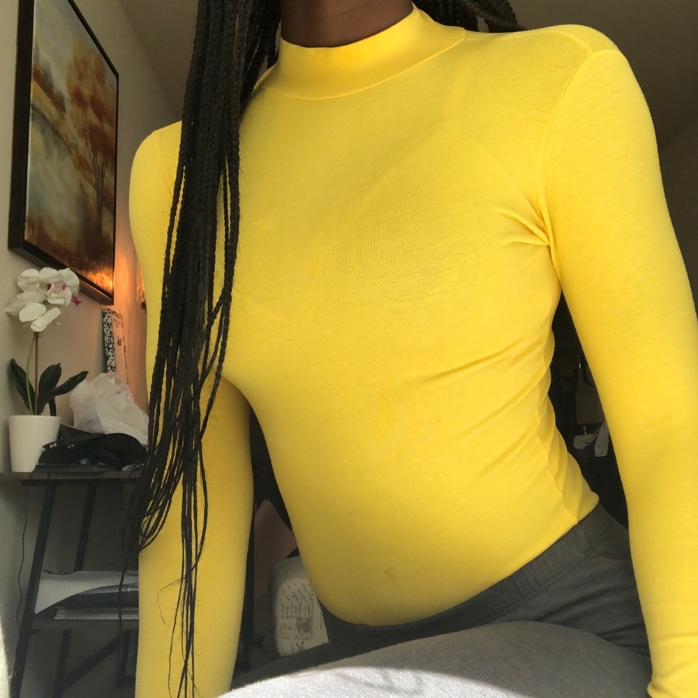 Yellow turtle neck body suit